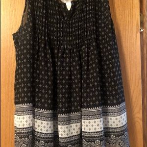 Sleeveless women’s top.Black/white sheer with black lining.CJ Banks 1X.Polyester